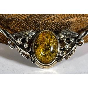 Silver and Baltic Amber Pendant Necklace with Floral Design.